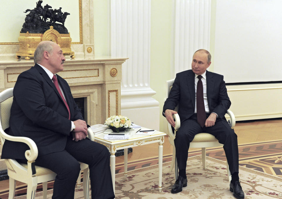 Russian President Vladimir Putin, right, and Belarusian President Alexander Lukashenko talk during their meeting in Moscow, Russia, Thursday, April 22, 2021. (Mikhail Klimentyev, Sputnik, Kremlin Pool Photo via AP)