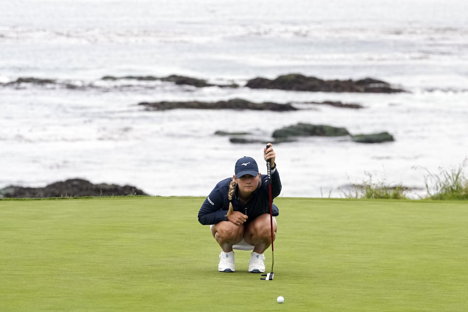 Bailey Tardy measure her putt on the ninth green during the second round of the U.S. Women's Open golf tournament at the Pebble Beach Golf Links, Friday, July 7, 2023, in Pebble Beach, Calif. (AP Photo/Darron Cummings)