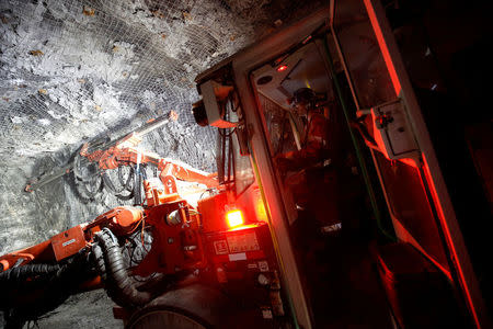 Adam Ladouceur operates an electric jumbo drill at Goldcorp Inc's Borden all-electric underground gold mine near Chapleau, Ontario, Canada, June 13, 2018. REUTERS/Chris Wattie