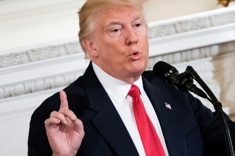 US President Donald Trump speaks to members of the National Governors Association and his administration in the State Dining Room of the White House on February 27, 2017