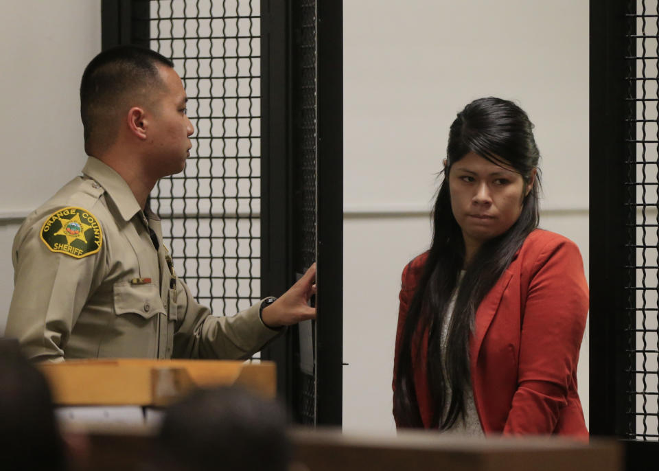 Vanesa Zavala arrives for a preliminary hearing at the West Justice Center in Westminster, California February 10, 2014. Zavala and Candace Marie Brito are facing charges in the beating death of Kim Pham in front of a Santa Ana nightclub. (AP Photo/Los Angeles Times, Mark Boster, Pool)