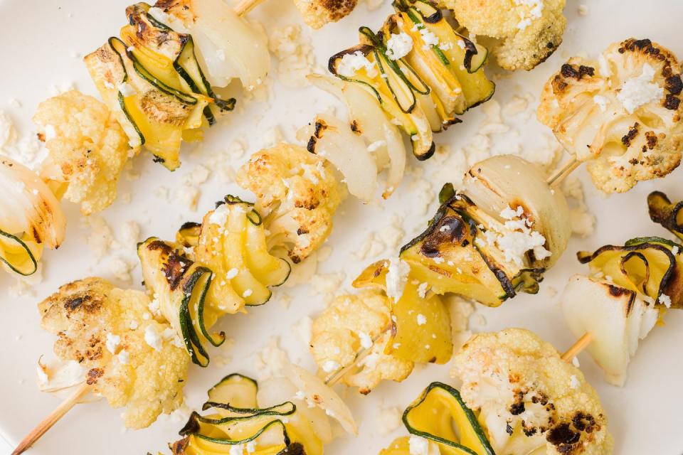 <p>Shaving the zucchini into long strips and then curling them creates a gorgeous effect.</p><p>Get the recipe from <a href="https://www.delish.com/cooking/recipe-ideas/recipes/a43682/zucchini-cauliflower-skewers-feta-recipe/" rel="nofollow noopener" target="_blank" data-ylk="slk:Delish;elm:context_link;itc:0;sec:content-canvas" class="link ">Delish</a>.<br></p>