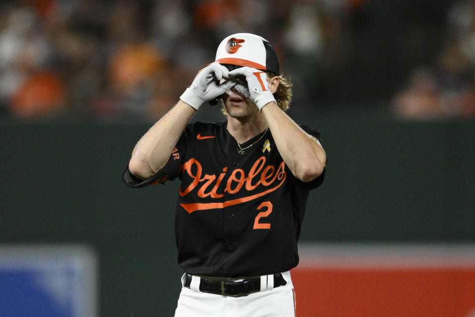 Baltimore Orioles' Gunnar Henderson gestures at second base after his double during the third inning of a baseball game against the Oakland Athletics, Friday, Sept. 2, 2022, in Baltimore. (AP Photo/Nick Wass)