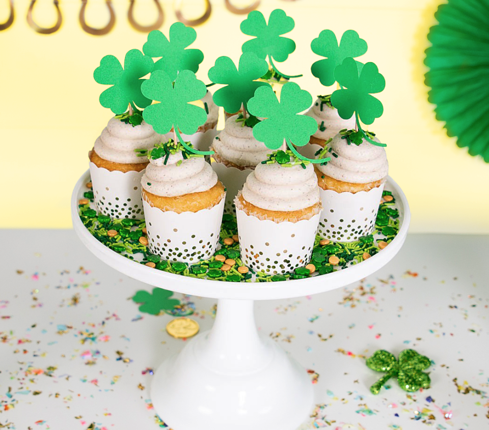 st patrick's day party: Festive St Paddy's Day cupcakes on pedestal plate