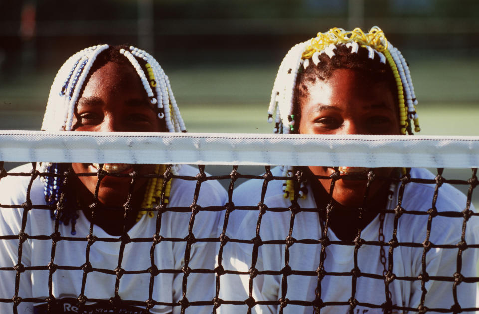 Teenagers Venus (left) and Serena Williams pose together during the Adidas International event in Sydney, Australia, on Jan. 16, 1998. (Photo: Clive Brunskill/Allsport via Getty Images)