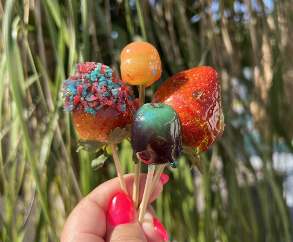 "Crack grapes," grapes (and other fruits) coated with melted Jolly Rancher candies, are going viral on TikTok, so we made our own version. (Photo: Terri Peters)