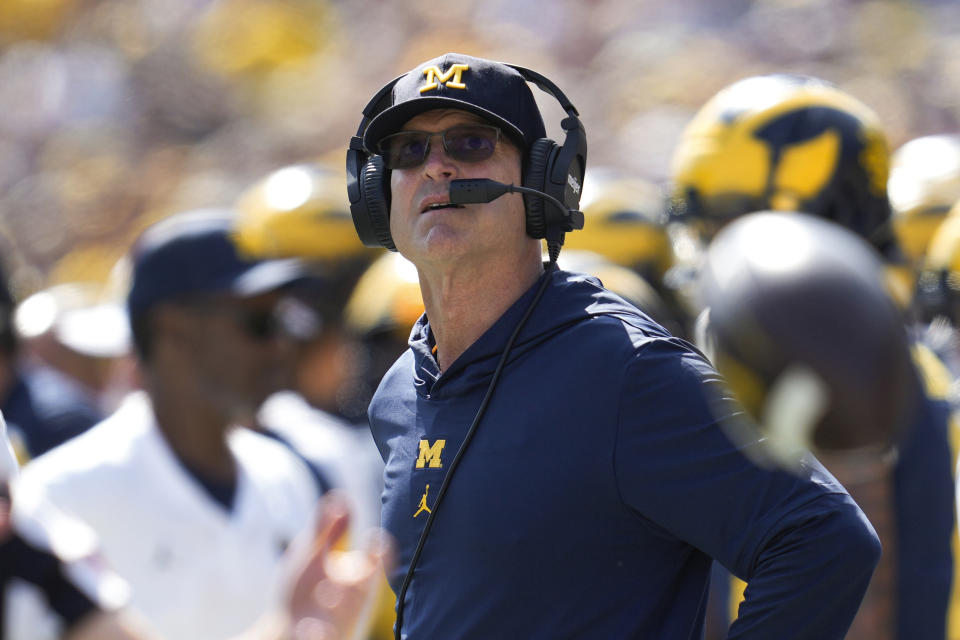 Michigan head coach Jim Harbaugh watches against Rutgers in the first half of an NCAA college football game in Ann Arbor, Mich., Saturday, Sept. 23, 2023. (AP Photo/Paul Sancya)