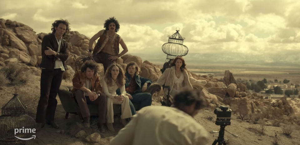 People sitting on a rocky landscape