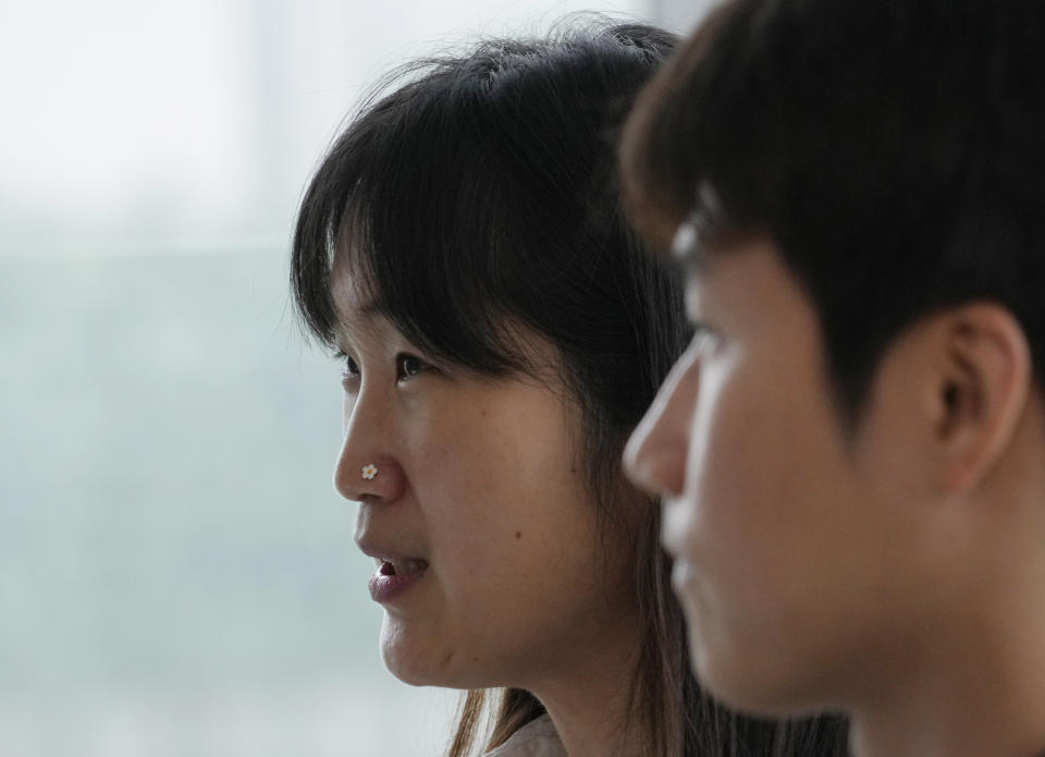 Borami Seo, left, a director at the Korea office of the animal welfare charity Humane Society International, speaks during an interview with Lee Sangkyung, a campaign manager at the Korea office of the animal welfare charity Humane Society International, at the National Assembly in Seoul, South Korea, Thursday, June 29, 2023. (AP Photo/Ahn Young-joon)