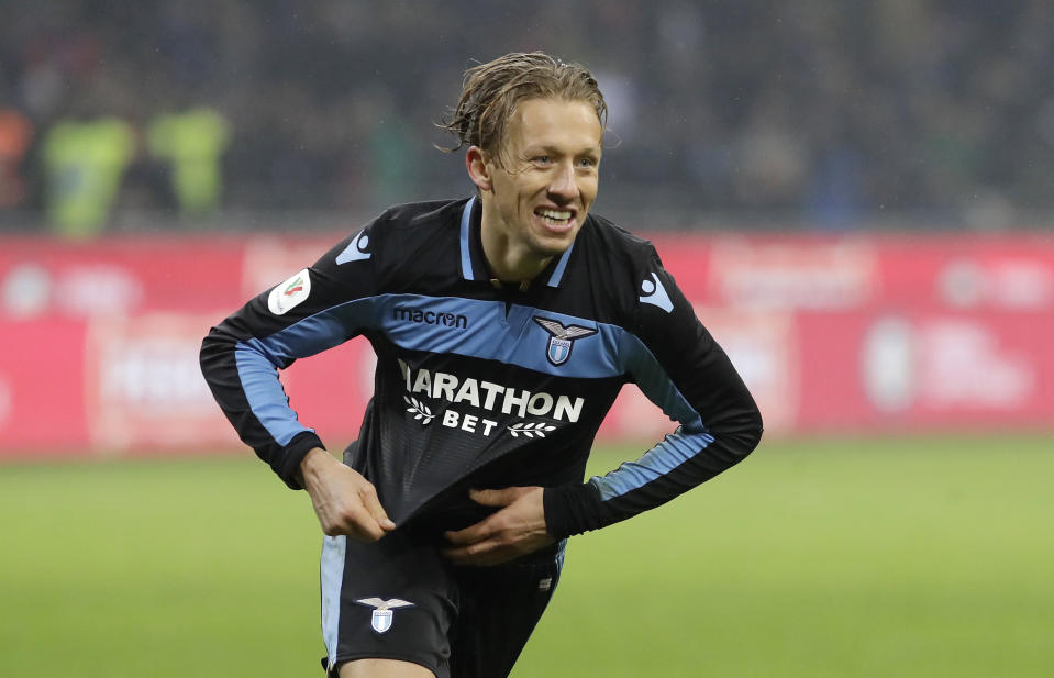 Lazio's Lucas Leiva celebrates after scoring the decisive penalty during an Italian Cup quarterfinal soccer match between Inter Milan and Lazio at the San Siro stadium, in Milan, Italy, Thursday, Jan. 31, 2019. Lazio won 5-4 following a shootout. (AP Photo/Luca Bruno)