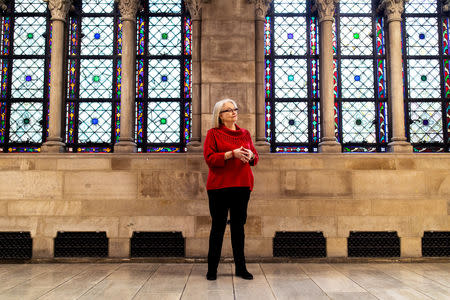 Artist Betsy Ashton poses for a portrait at Riverside Church in New York, U.S., March 10, 2019. Betsy has her "Portraits of Immigrants: Unknown Faces, Untold Stories" on display until April 22, 2019. REUTERS/Demetrius Freeman