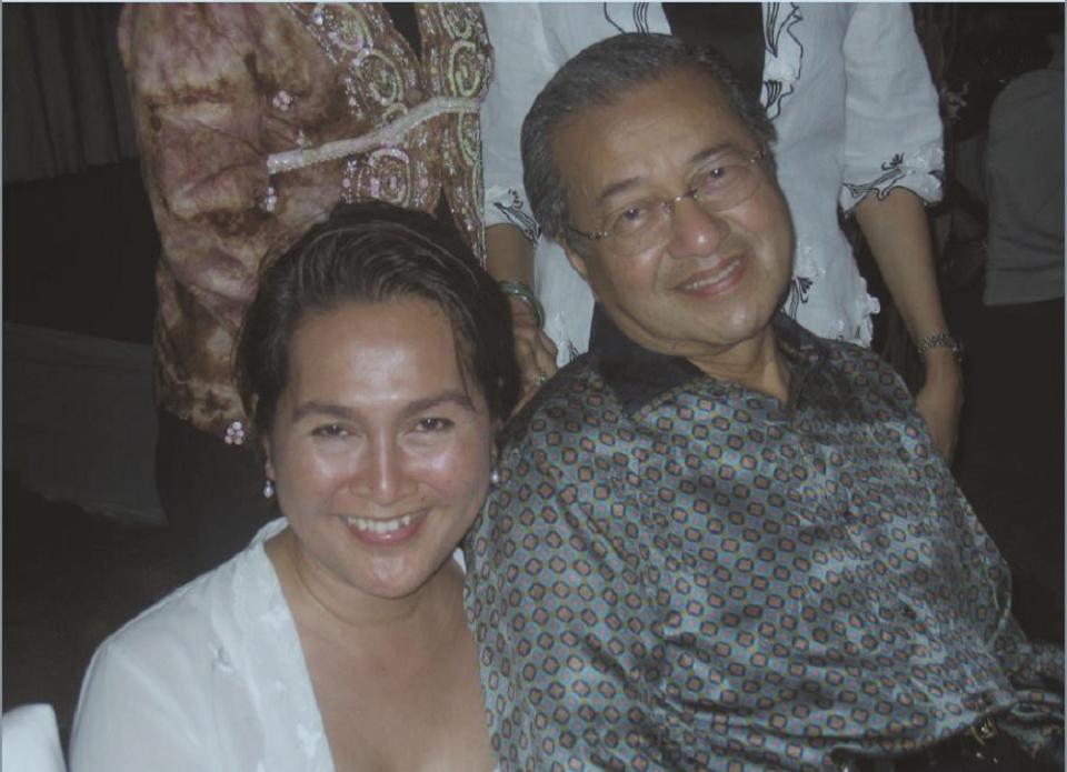 Undated photo of the late Yasmin Ahmad with Prime Minister Tun Dr Mahathir Mohamad. — Malay Mail pic