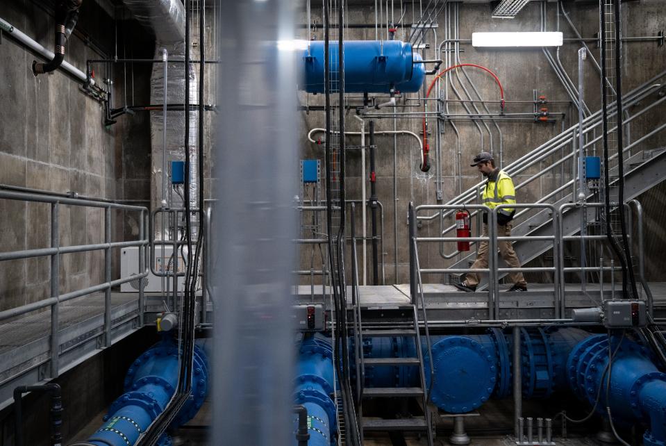 Spencer Hartman, a wastewater/lab supervisor, in the UV treatment building at a water treatment plant in Pinedale, Wyoming, on March 23, 2022.