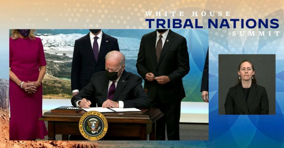 President Joe Biden signs an executive order on Nov. 15 to improve public safety and criminal justice for Native Americans and to address the crisis of missing or murdered Indigenous people.