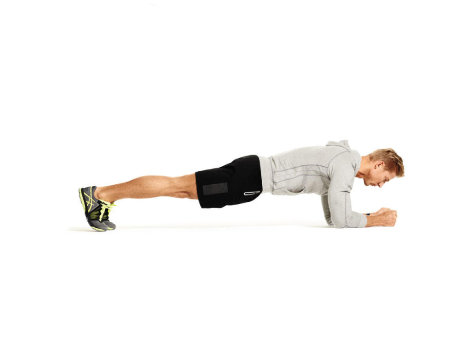 <p>James Michelfelder</p>How to Do It<ol><li>Assume a plank position with elbows directly under shoulders and feet together, to start. </li><li>Support your <a href="https://www.muscleandfitness.com/training/workout-routines/best-bodyweight-workout-all-time" rel="nofollow noopener" target="_blank" data-ylk="slk:body weight;elm:context_link;itc:0;sec:content-canvas" class="link ">body weight</a> with your forearms and toes, maintaining a neutral spine and a tight core.</li><li>Drive your right foot up toward your chest, then quickly bring it back as you drive your other leg toward your chest. Continue alternating as if you were doing high knees.</li><li>Perform 4 x 30-sec. rounds </li></ol>