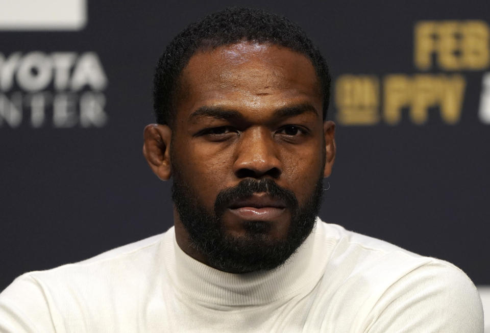 LAS VEGAS, NEVADA - DECEMBER 13:  UFC light heavyweight champion Jon Jones interacts with media during the UFC 247 press conference at T-Mobile Arena on December 13, 2019 in Las Vegas, Nevada. (Photo by Jeff Bottari/Zuffa LLC)