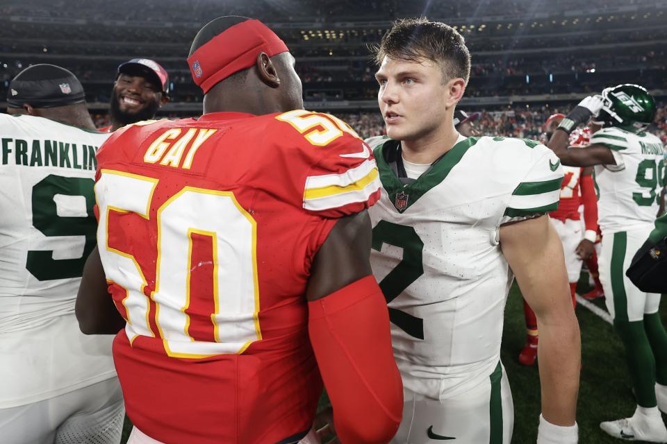New York Jets quarterback Zach Wilson talks with Kansas City Chiefs linebacker Willie Gay after game, Sunday, Oct. 1, 2023, in East Rutherford, N.J. | Adam Hunger, Associated Press