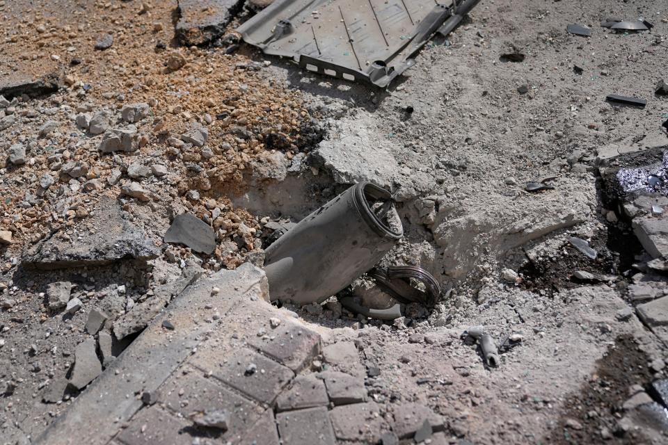 A rocket from the Gaza Strip struck a street in Ashkelon, Israel, on Saturday, Oct. 7, 2023. Palestinian militants in the Gaza Strip infiltrated Saturday into southern Israel and fired thousands of rockets into the country while Israel began striking targets in Gaza in response.