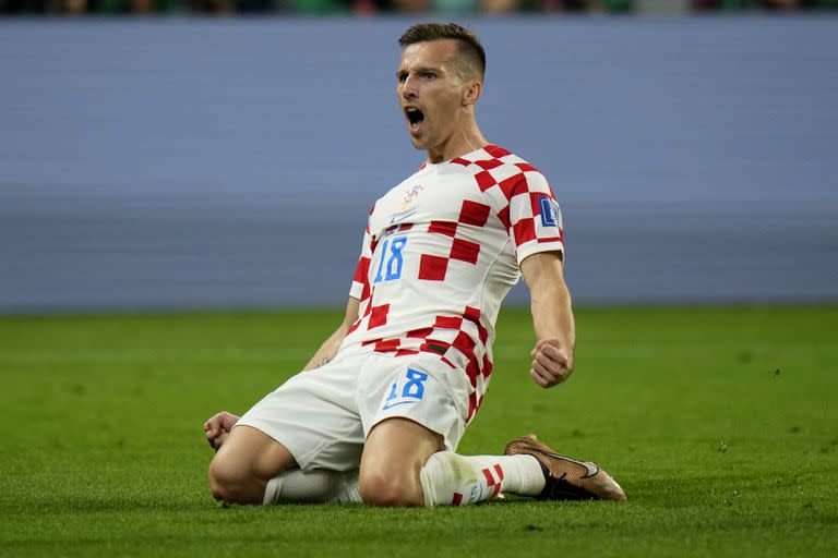 Croatia's Mislav Orsic celebrates after scoring his side's second goal during the World Cup third-place playoff soccer match between Croatia and Morocco at Khalifa International Stadium in Doha, Qatar, Saturday, Dec. 17, 2022. (AP Photo/Francisco Seco)