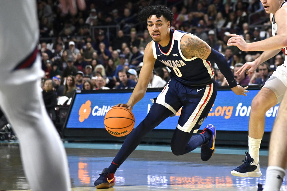 Gonzaga guard Julian Strawther (0) drives the ball against Saint Mary's during the first half an NCAA college basketball game in the final of the West Coast Conference men's tournament Tuesday, March 7, 2023, in Las Vegas. (AP Photo/David Becker)