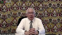 In this image taken from a video released by Malaysian Judiciary, former Prime Minister Najib Razak speaks during a press conference in Malaysia after the court case, Wednesday, Dec. 8, 2021. Malaysia's Appeal Court has upheld the conviction of Najib linked to the massive looting of the 1MDB state investment fund that brought down his government in 2018. (Malaysian Judiciary via AP)