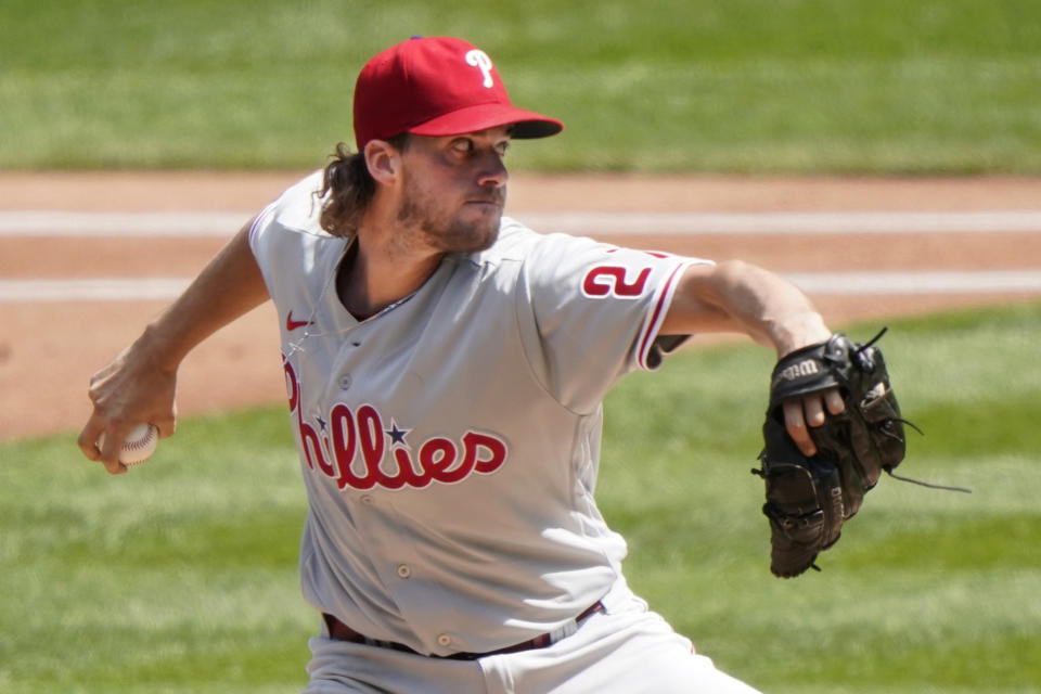 Philadelphia Phillies starting pitcher Aaron Nola winds up during the first inning of a baseball game against the New York Mets, Sunday, Sept. 6, 2020, in New York. (AP Photo/Kathy Willens)