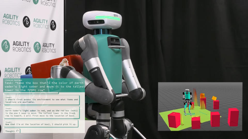Standbild aus einem Demovideo des Digit-Roboters, der eine rote Kiste hält.  Eine Einblendung unten links zeigt den inneren Monolog des Roboters, während eine Einblendung unten rechts eine 3D-Karte zeigt, die der Roboter zur Navigation verwendet.