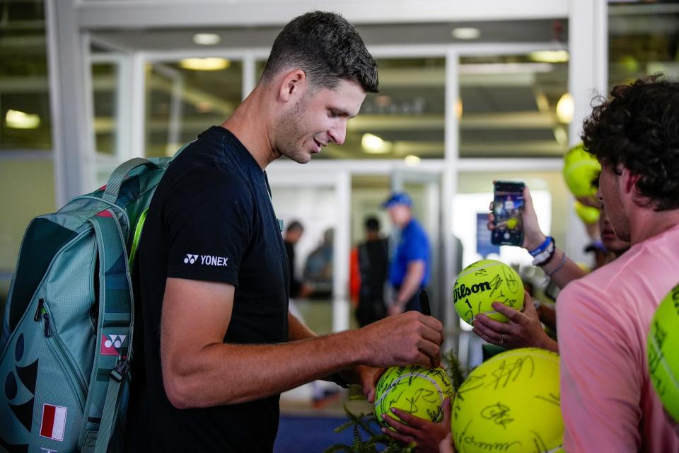 Hubert Hurkacz of Poland signs autographs for fans as he arrives for the Western & Southern Open at the Lindner Family Tennis Center in Mason Sunday, August, 13, 2023.
(Credit: Cara Owsley/The Enquirer)