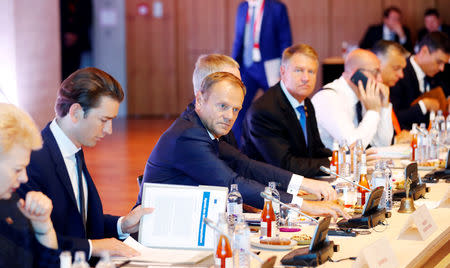 Austrian Chancellor Sebastian Kurz, European Council President Donald Tusk and Romanian President Klaus Iohannis attend the European Union leaders informal summit in Salzburg, Austria, September 20, 2018. REUTERS/Leonhard Foeger
