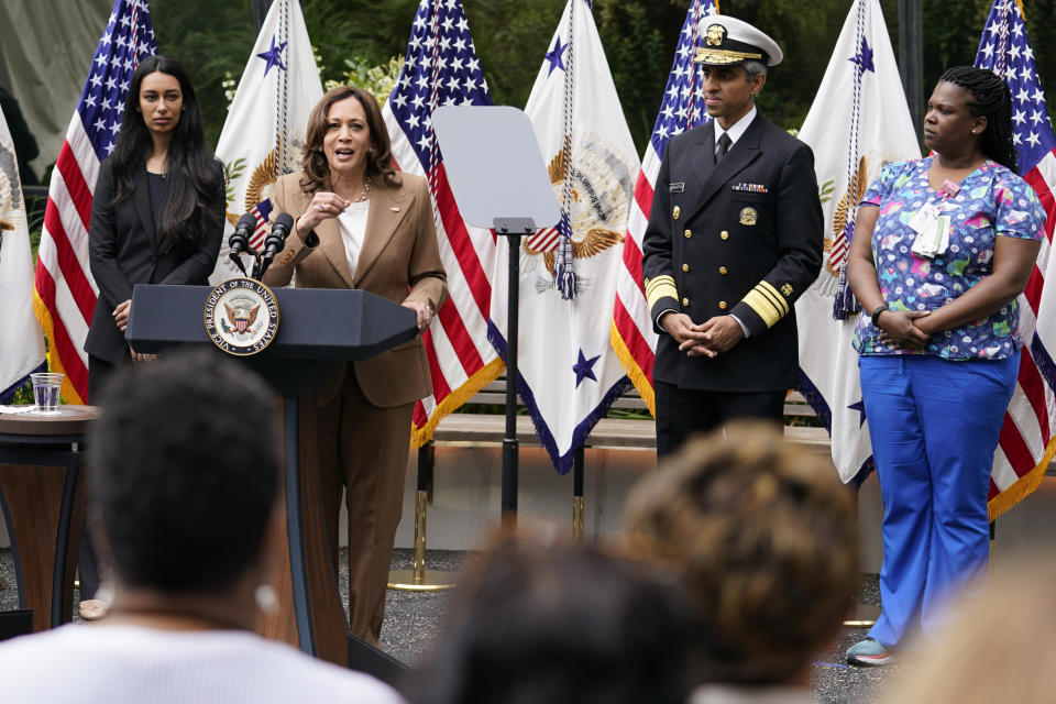 Vice President Kamala Harris, joined by from left, Dr. Sasha Hamdani, Surgeon General Vivek Murthy, and Monique Cauley of the Children's National Hospital staff, speaks hospital staff at Children's National Hospital, Monday, May 23, 2022, about mental health and wellness. (AP Photo/ Carolyn Kaster)