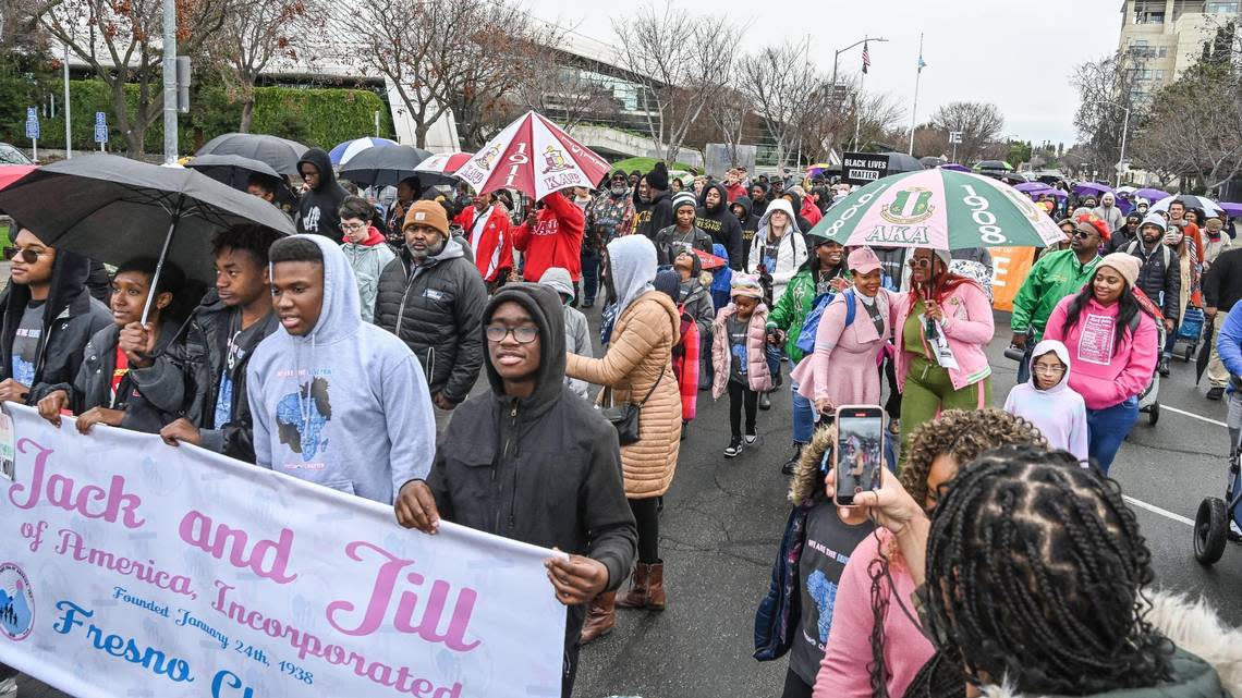 Hundreds join the 39th annual Martin Luther King Jr Day March from Fresno City Hall to the Fresno Veterans Memorial Auditorium on Monday, Jan. 16, 2023.