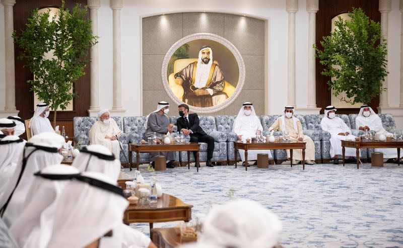 French President Emmanuel Macron offers condolences to United Arab Emirates' President and ruler of Abu Dhabi Sheikh Mohammed bin Zayed Al Nahyan in Abu Dhabi