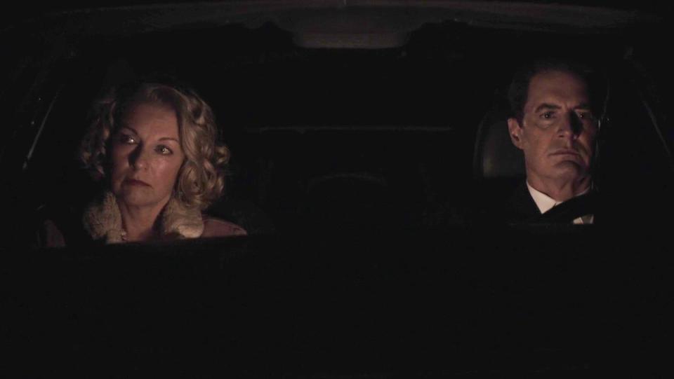 Carrie Page and Dale Cooper drive in Twin Peaks.