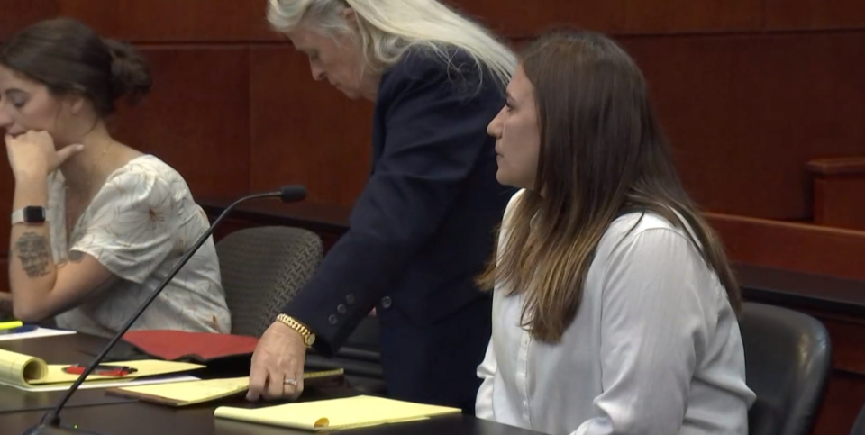 Crystal Smith, right, and part of her defense team prepare for her no-contest plea in her tampering with evidence trial Friday in a St. Johns County courtroom. She is the mother of Aiden Fucci, who is serving a life sentence in the 2021 slaying of Tristyn Bailey, 13.