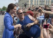 <p><b><b><b>The crowd went wild for Kate as she and William visited the Brandenburg Gate.<br><i>[Photo: PA]</i> </b></b></b></p>