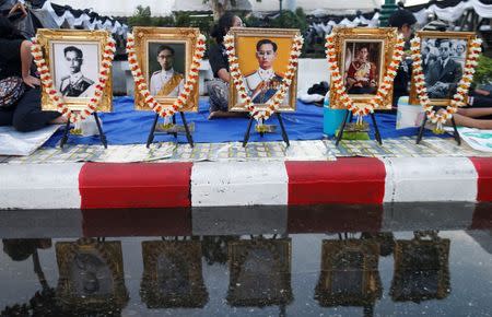 Pictures of late King Bhumibol Adulyadej are seen in Bangkok. REUTERS/Soe Zeya Tun