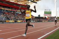 Athletics - Gold Coast 2018 Commonwealth Games - Men's 5000m Final - Carrara Stadium - Gold Coast, Australia - April 8, 2018. Gold medalist Joshua Kiprui Cheptegei of Uganda celebrates. REUTERS/Paul Childs