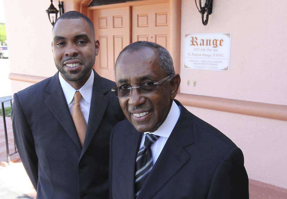 In this file photo from June 12, 2012, N. Patrick Range, (right) and his son, N. Patrick Range II, (left) are at their family Range Funeral Home at 5727 NW 17th Ave. in Miami’s Liberty City neighborhood. Patrick Range II, worked for a law firm before he went to work with his dad at Range where, in 2024, he serves as operator and manager.