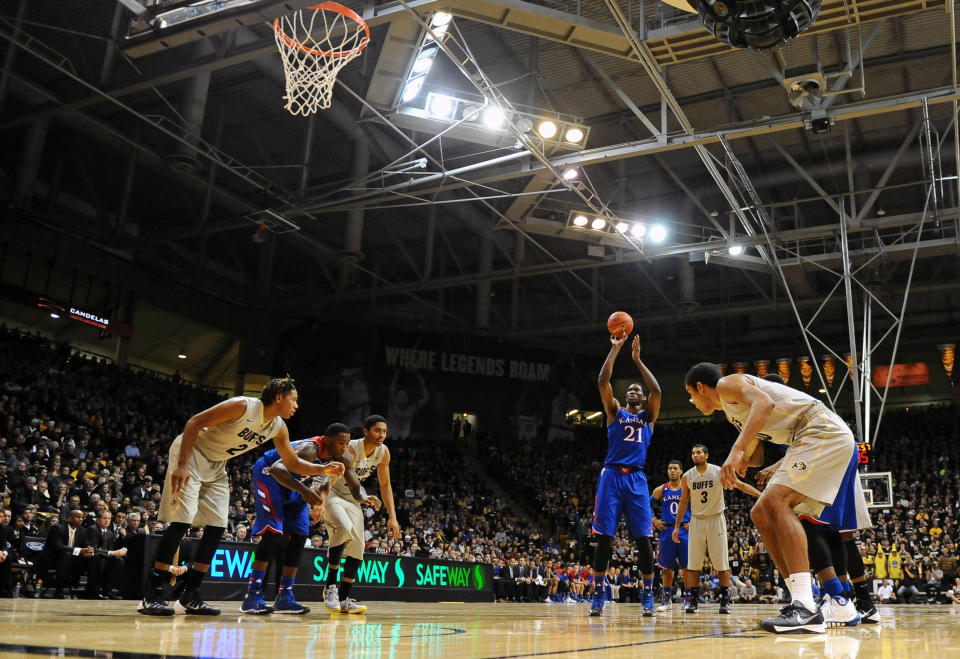 Dec 7, 2013; Boulder, CO, USA; Kansas Jayhawks center <a class="link " href="https://sports.yahoo.com/nba/players/5294" data-i13n="sec:content-canvas;subsec:anchor_text;elm:context_link" data-ylk="slk:Joel Embiid;sec:content-canvas;subsec:anchor_text;elm:context_link;itc:0">Joel Embiid</a> (21) at the free throw line in the first half against the Colorado Buffaloes at Coors Events Center. Mandatory Credit: Ron Chenoy-USA TODAY Sports