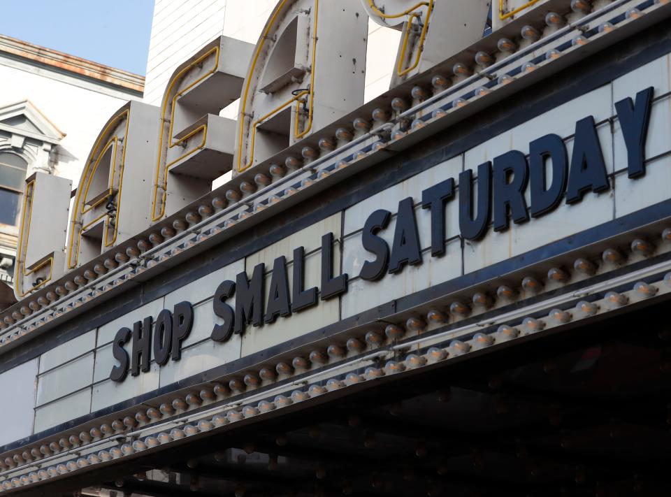 A sign advertises shop small Saturday during a shop small walking tour, Thursday, Nov. 9, 2023, at the Lafayette Theater in Lafayette, Ind.