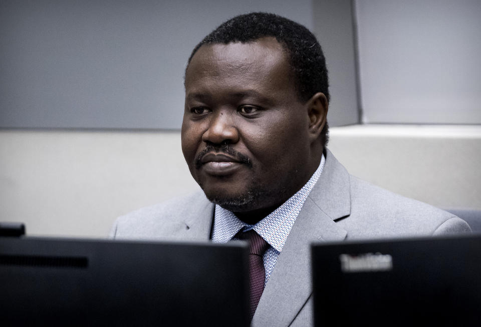 FILE - In this Friday, Jan. 25, 2019 file photo, the chief of Central African Republic's soccer federation Patrice-Edouard Ngaissona stands during his initial appearance before the judges of the International Criminal Court (ICC) in The Hague, the Netherlands. Two leaders of a predominantly Christian militia, Patrice-Edouard Ngaissona and Alfred Yekatom, involved in a bitter conflict with Muslim forces in the Central African Republic have appeared at the International Criminal Court for a hearing, that started Thursday Sept. 19, 2019, at which prosecutors are seeking to persuade judges that they have sufficient evidence to send the suspects to trial. (Koen Van Well/Pool photo via AP, File)