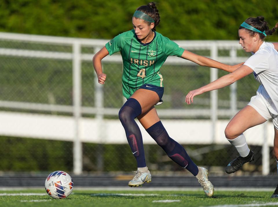 Cathedral Fighting Irish Eliza Langfeldt (4) rushes after the ball during the game against the Bishop Chatard Trojans on Wednesday, Sept. 28, 2022, at Bishop Chatard High School in Indianapolis.  