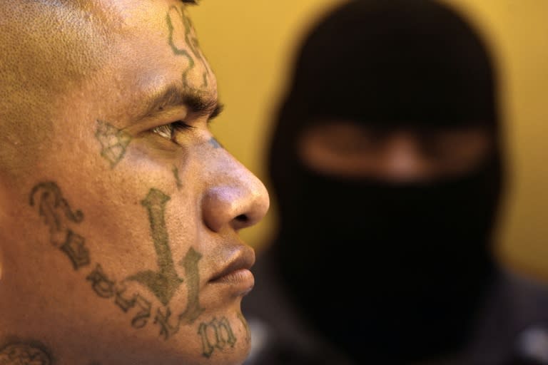 A former 18th Street gang member attends a Bible study class at San Francisco Gotera prison