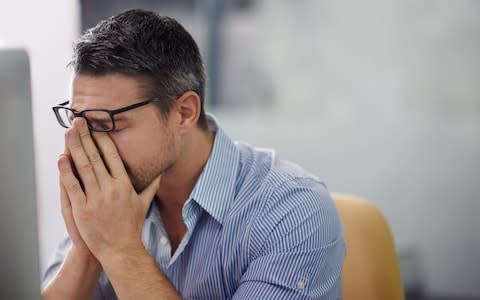 Stressed man at work