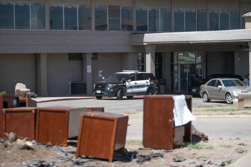 Pueblo police escort residents out of the Val U Stay Inn & Suites motel on Thursday, April 25, 2024.