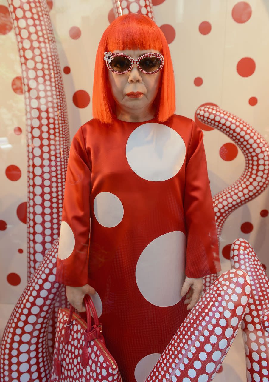 NEW YORK, NY - JULY 10: A wax figure of artist Yayoi Kusama on display during the Louis Vuitton And Yayoi Kusama Collaboration Unveiling at Louis Vuitton Maison on July 10, 2012 in New York City. (Photo by Dimitrios Kambouris/WireImage)