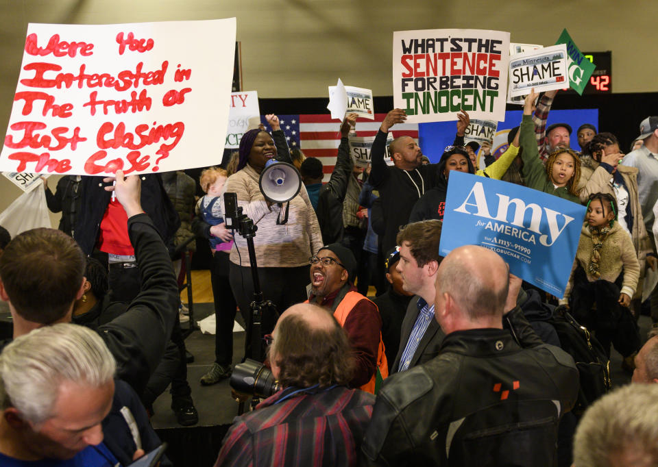 ST LOUIS PARK, MN - MARCH 01: Protestors celebrate after hearing that a campaign rally for Democratic presidential candidate Sen. Amy Klobuchar (D-MN) was cancelled after they took the stage on March 1, 2020 in St Louis Park, Minnesota. The protestors chanted "Black Lives Matter" and called for justice for Myon Burrell, who was convicted in 2002 when Klobuchar was Hennepin County Attorney. (Photo by Stephen Maturen/Getty Images)