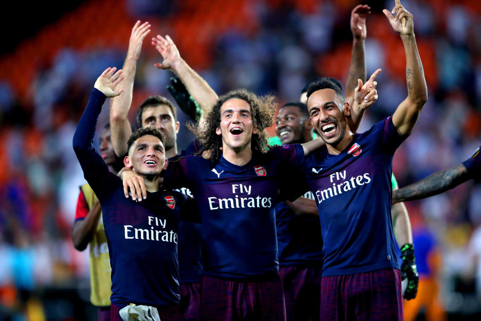 Arsenal's Lucas Torreira (left), Matteo Guendouzi and Pierre-Emerick Aubameyang celebrate the results at the end of the UEFA Europa League, Semi Final, Second Leg at the Camp de Mestalla, Valencia. (Photo by Nick Potts/PA Images via Getty Images)