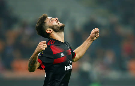 Soccer Football - Europa League - AC Milan vs FK Austria Wien - San Siro, Milan, Italy - November 23, 2017 AC Milan's Patrick Cutrone celebrates scoring their third goal REUTERS/Alessandro Garofalo