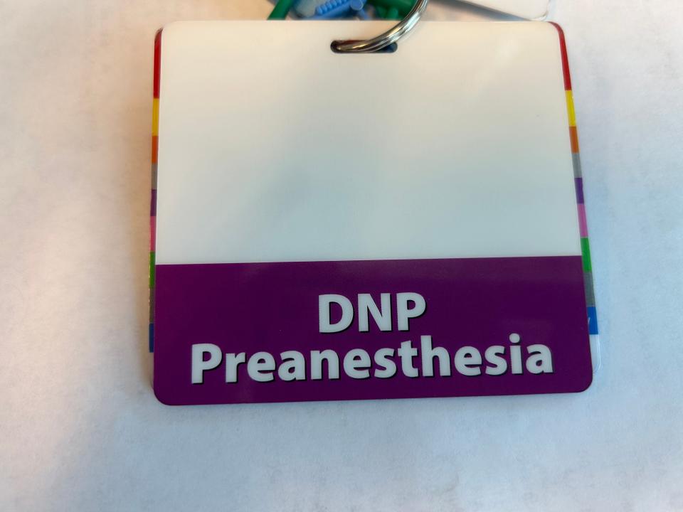 Rodolfo Jaravata-Hanson celebrated his DNP degree by buying a badge that showed off his newest credentials, but later he worried if he would get in trouble for wearing it.